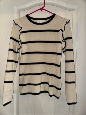 Lovely Melody Cream Sweater with Black Stripes and Ruffle Shoulders